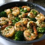 Delicious Garlic Butter Shrimp & Broccoli skillet dish, featuring plump shrimp and vibrant green broccoli.